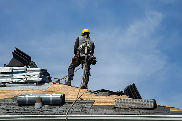 Professional Roofing technician working in Munford, AL